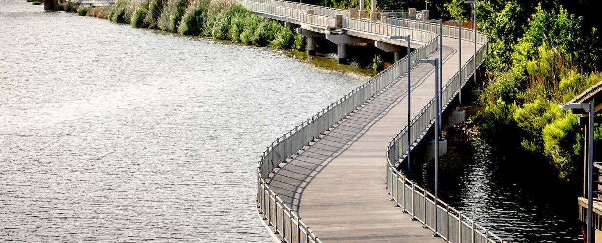 trail winding along the river at Waco Riverwalk